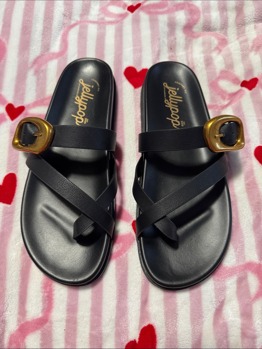 Jellypop Black Slide Sandals with Gold Buckle Accent